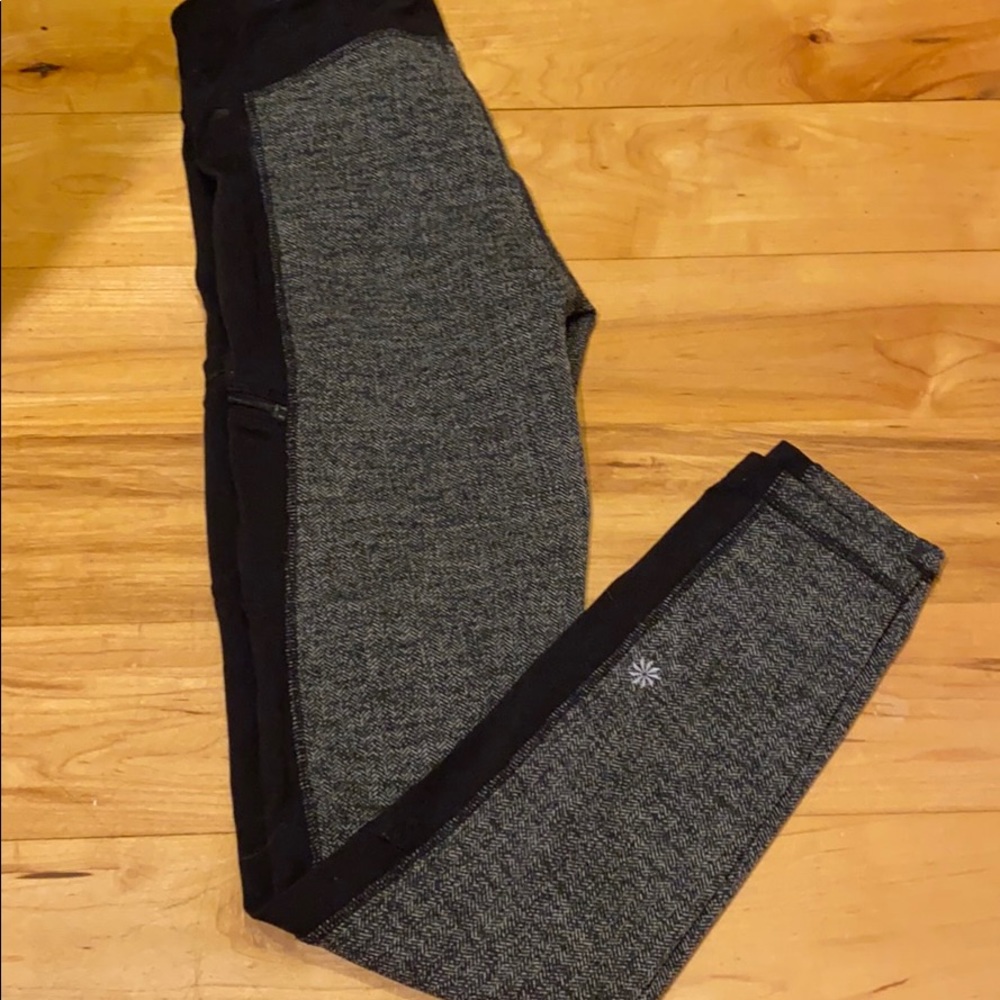 Athleta black and chevron leggings with zippers